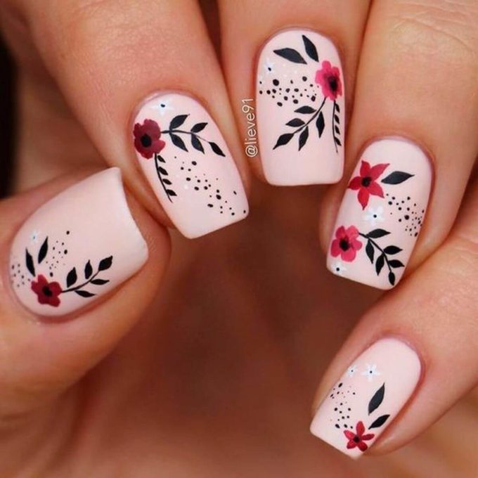 light icy pink with pink floral painted short spring nails designs ideas 2022