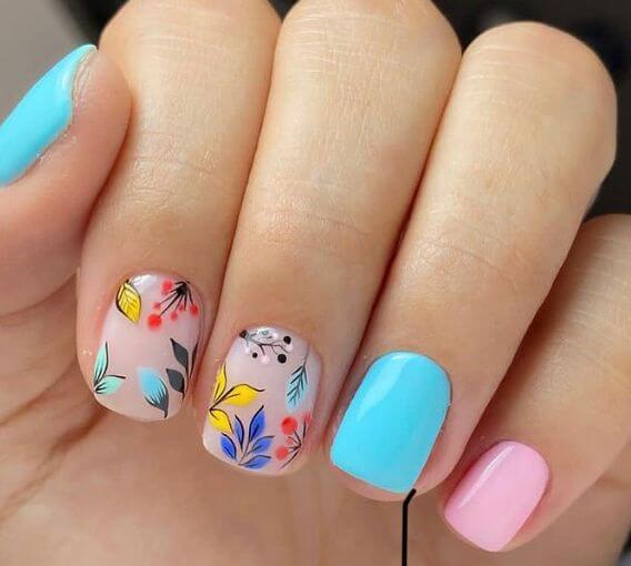 short aqua blue and pink with floral designs nails art ideas for spring 2022