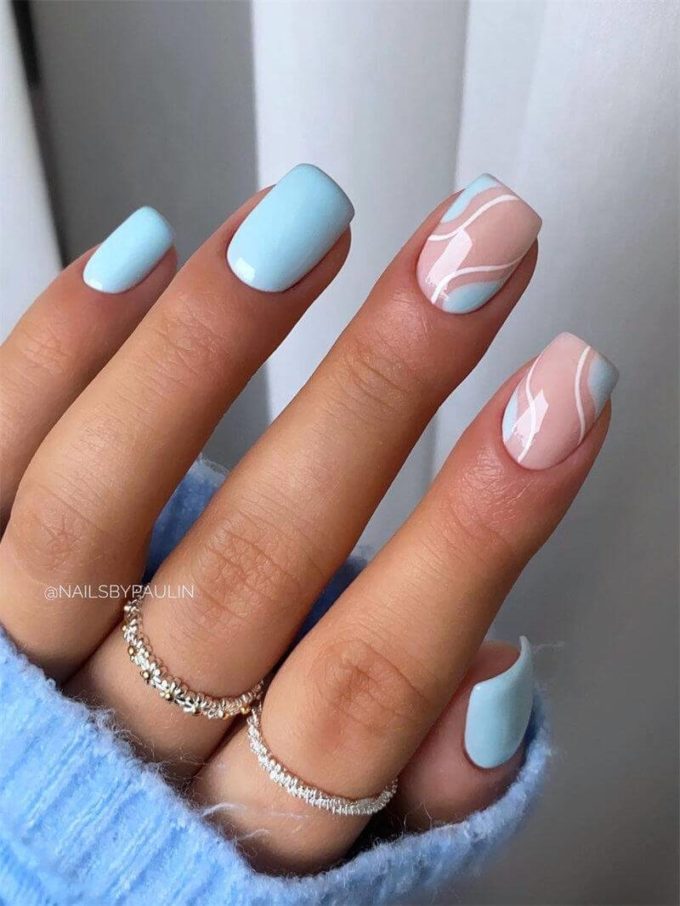 nude with wavy design baby blue nails art idea