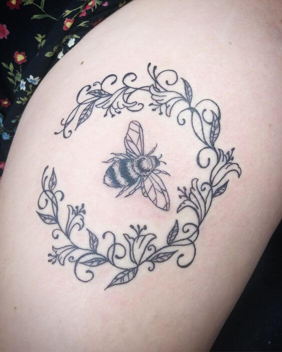 honeybee with honeysuckle june birth flower ring tattoo design idea for females