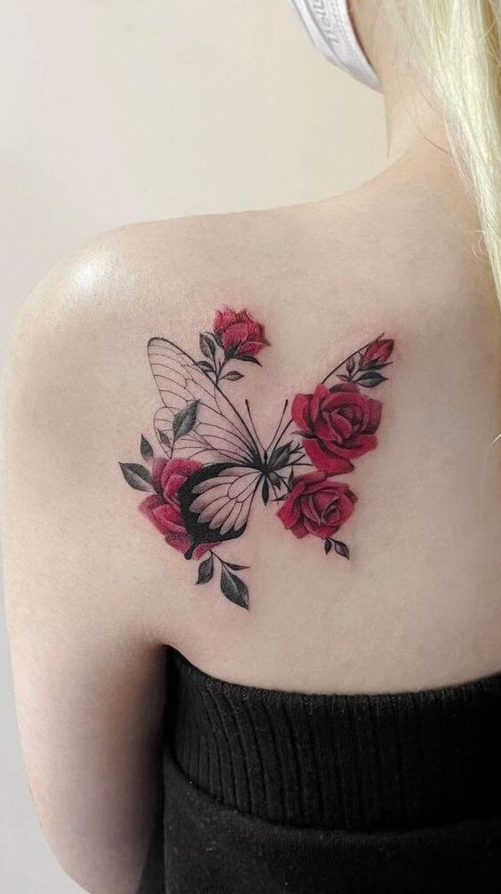butterfly with roses june birth flower tattoo design idea on shoulder blade for females
