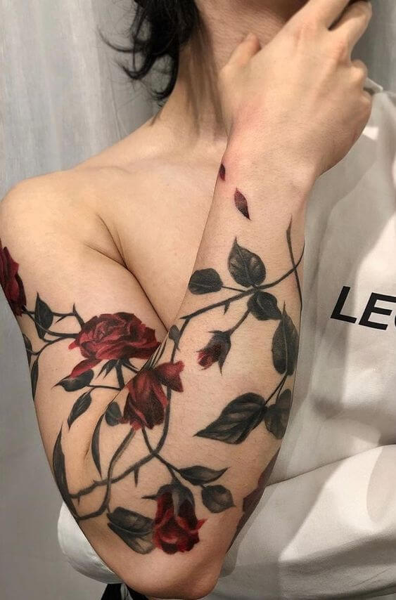 full arm june birth flower rose with vine and leaves tattoo design idea for females