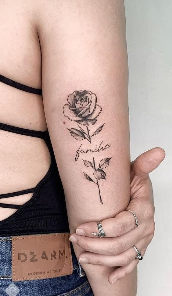 name familia with rose june birth flower tattoo design idea on back arm for females