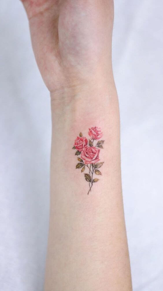 roses bouquet june birth flower tattoo design idea on side wrist for females