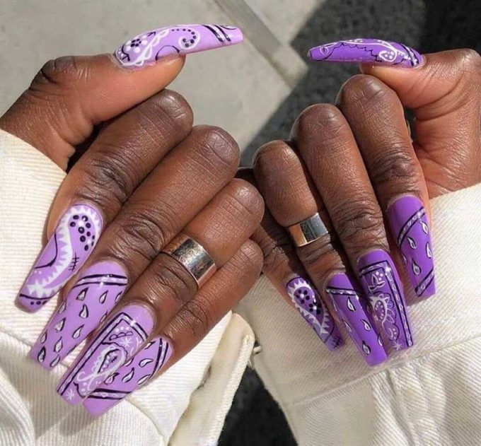 black and white pattern on lavender and purple long square nail art designs idea for 2022