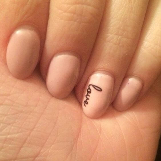 short cute minimalistic love written beige oval shape nail art designs idea for 2022 