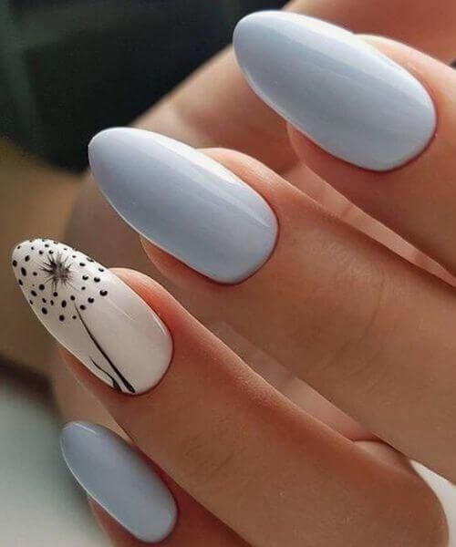 pastel blue and white with dandelion oval shaped nail art designs idea for spring season 2022