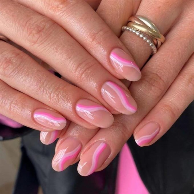 pink swirly light beige oval nail art design ideas for 2022