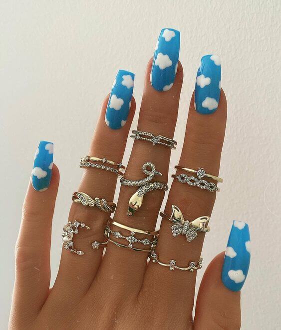 sky blue with clouds acrylic nails art designs idea for 2022