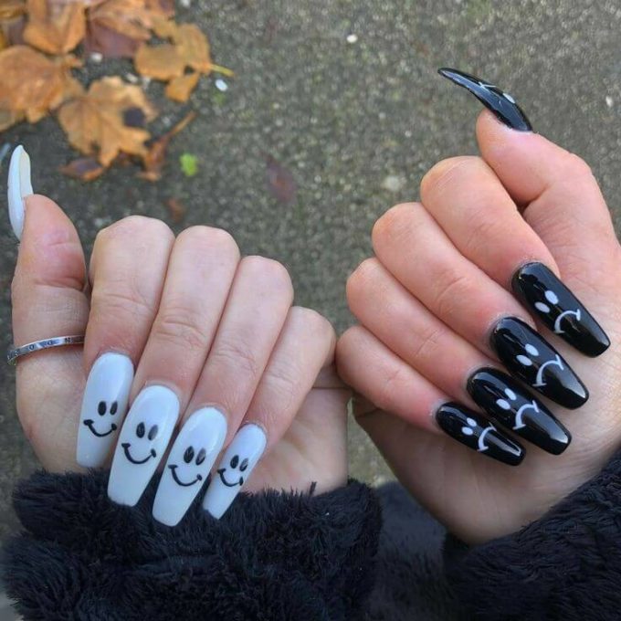 smiley and sad face on white and black acrylic nails art designs idea for 2022