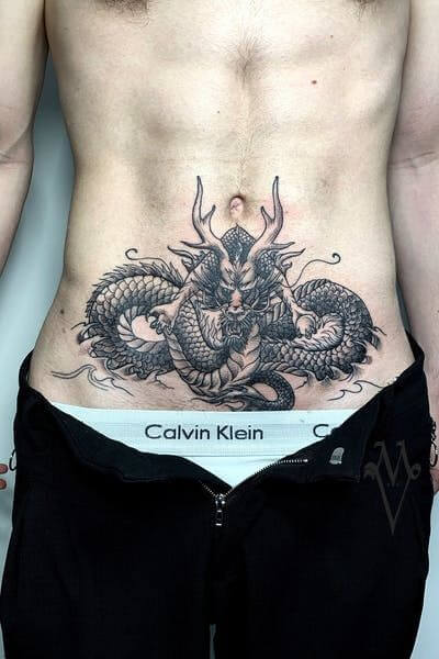 dragon stomach abs v-line tattoo design idea for men