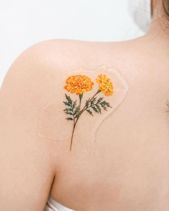small marigold october birth flower tattoos designs idea on back shoulder for females