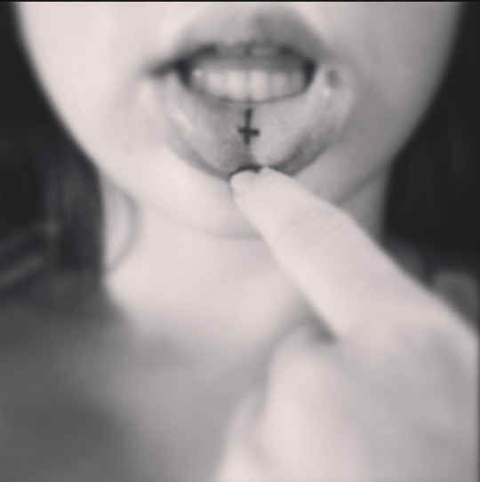 cross sign minimal inner lip tattoo design idea for females