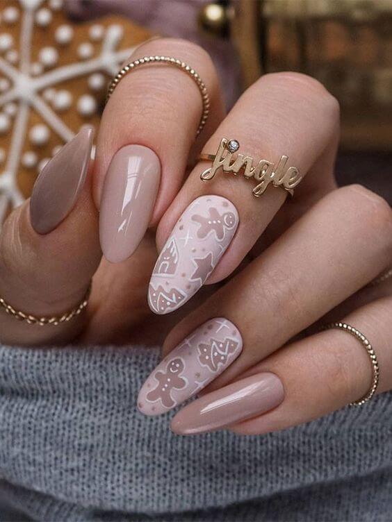 long  round shaped nude and beige gingerbread nails art designs idea for christmas holidays