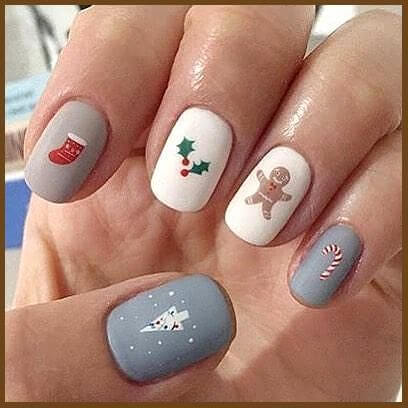 grey and white with christmas items and gingerbread nails art designs idea