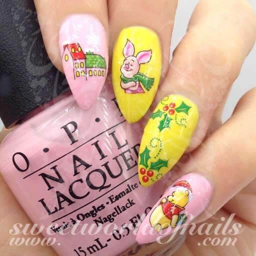 pointy christmas themed pink and yellow winnie the pooh nail art design idea