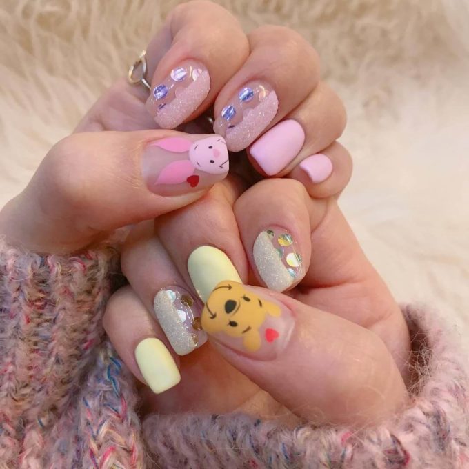 matte pink and yellow winnie the pooh nails art designs idea