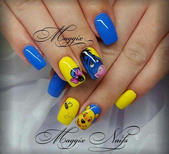 glossy blue and yellow painted winnie the pooh nails art designs idea