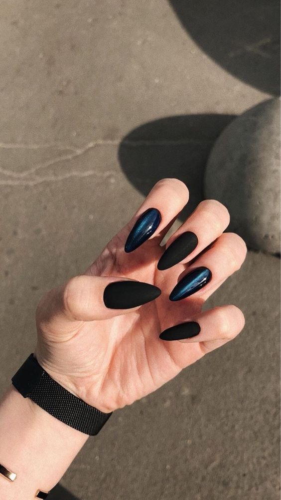trendy black matte with cat eye nail art design idea