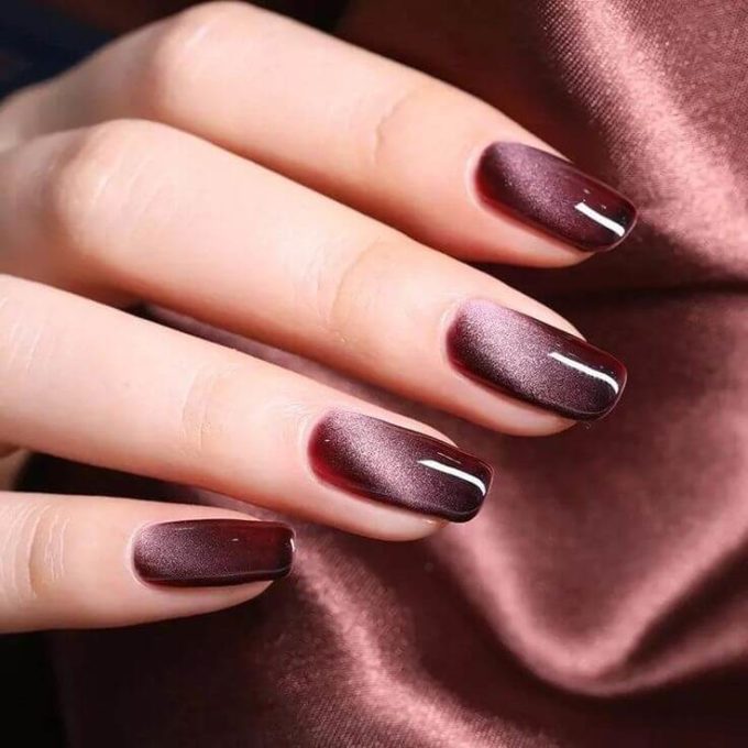 aesthetically pleasing soft mauve and pink shaded cat eye nail art design ideas