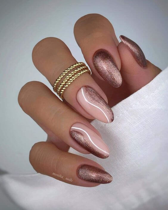 round matte and shimmery marble soft pink nude cat eye nail design idea