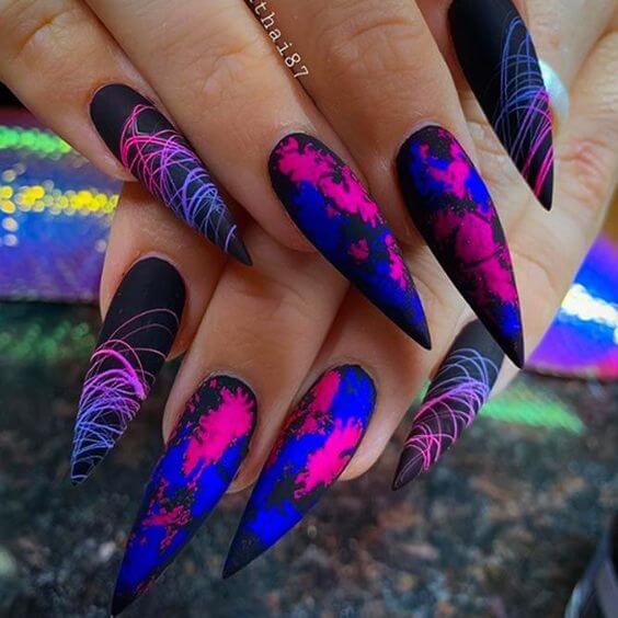 unique long pointy neon blue and pink abstract on matte black nails designs ideas