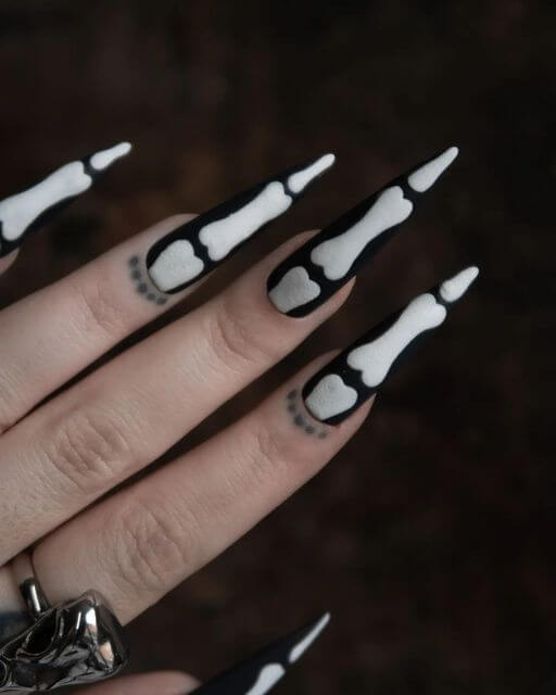 white and black skeleton boney finger unique nail design for Halloween