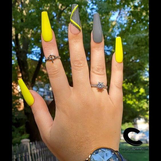 yellow and grey coffin with unique geometric lines nail art design ideas
