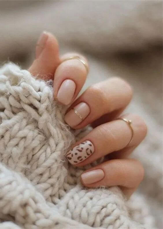 simple beige cheetah print nail art design idea