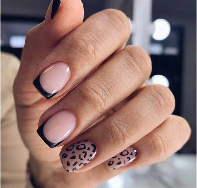 black french tip and cheetah print nail art design idea