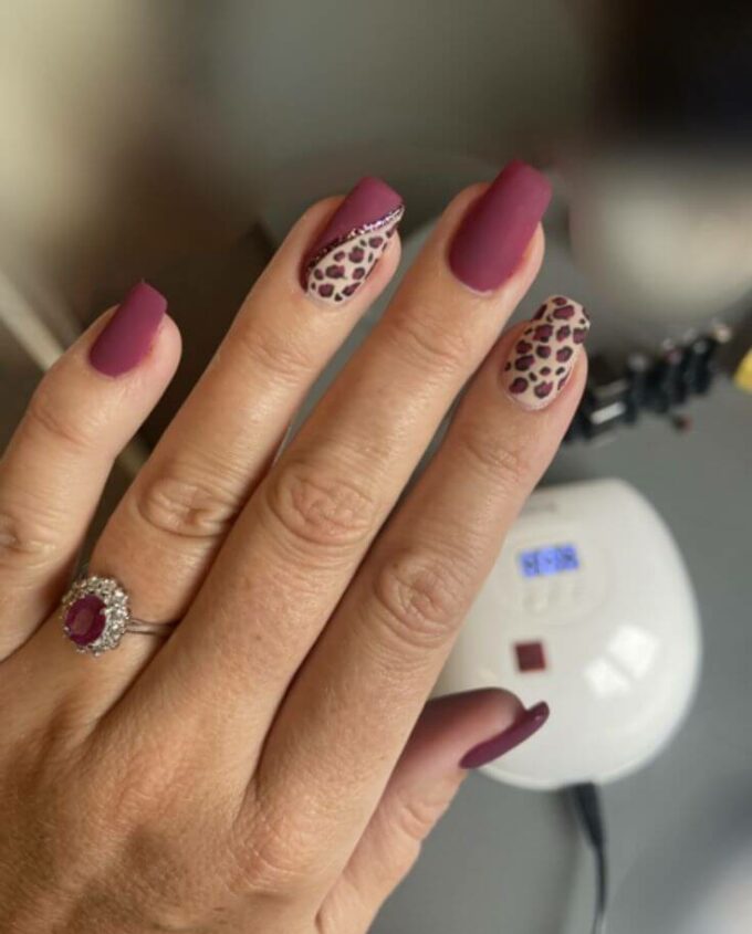 maroon matte with cheetah print nail art design idea