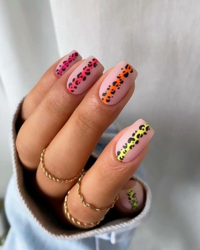 nude and rainbow strip with cheetah print nail art design idea