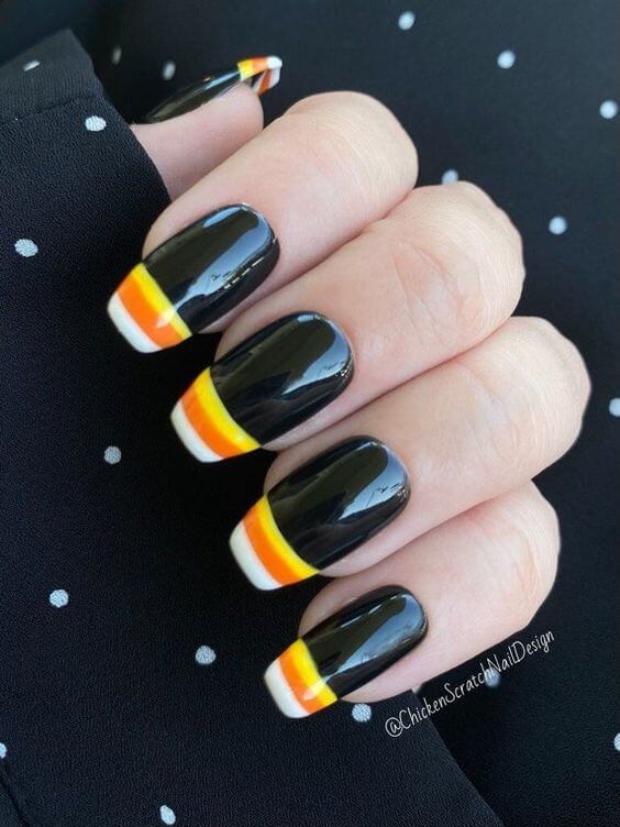 black with french tip candy corn nail art design idea