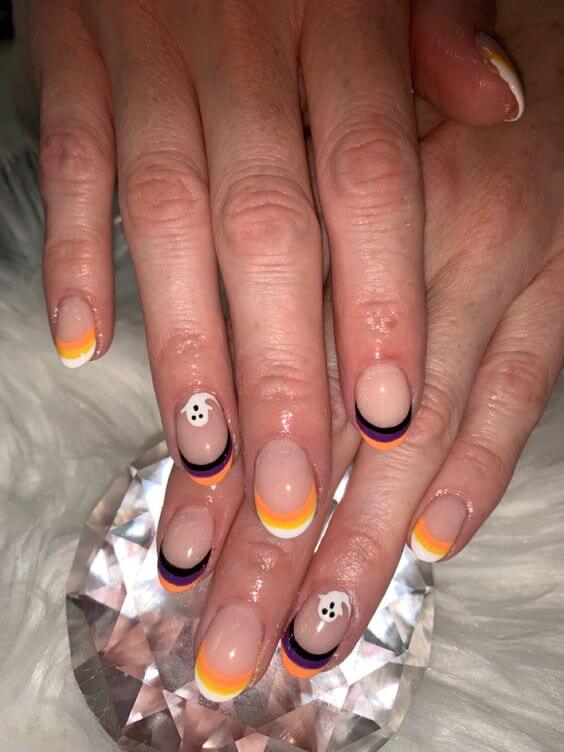 ghost on nude with french tips candy corn nails art designs idea