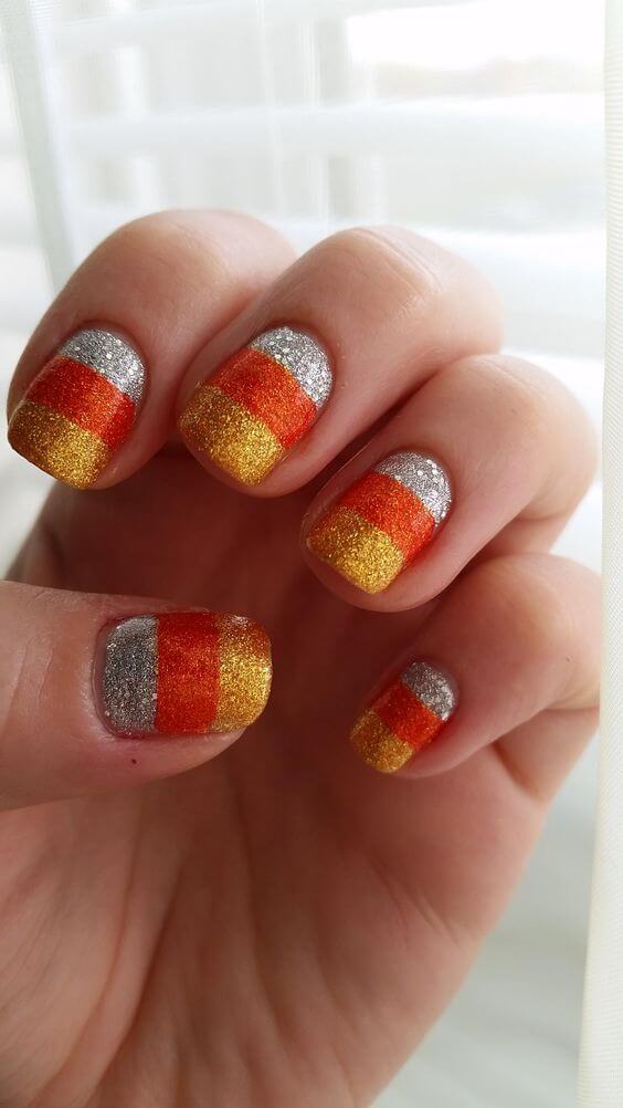 glitter candy corn nail art design idea