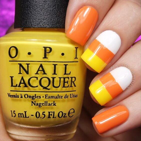 simple candy corn nail art design idea