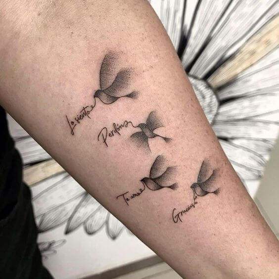 dotwork birds with children names tattoo designs on forearm