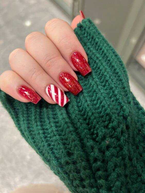 red and white candy cane stripes nail art for Christmas