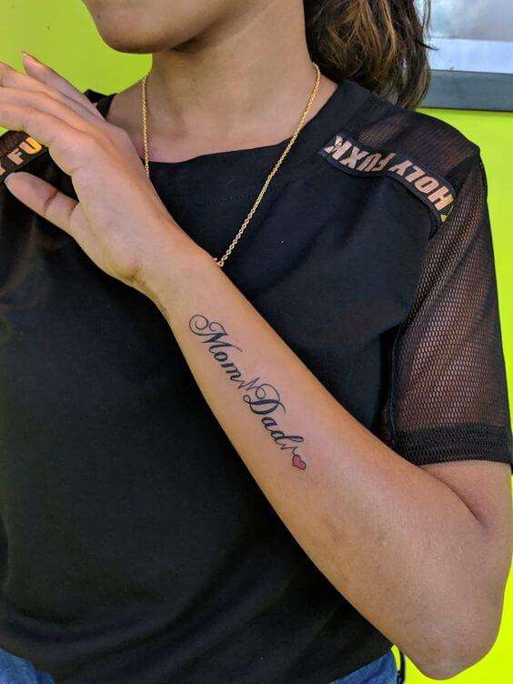 cute heart and lifeline mom and dad tattoo design on side arm