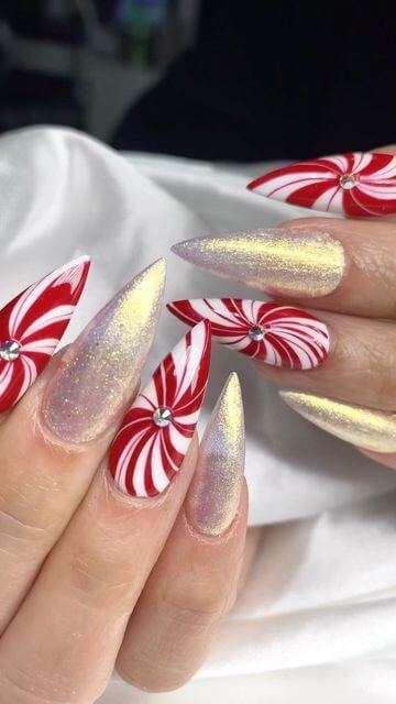 stiletto silver glitter and candy cane nails designs for Christmas 