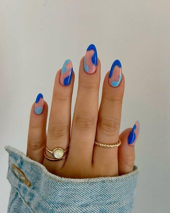 nude with light and dark blue abstract summer vacation nails