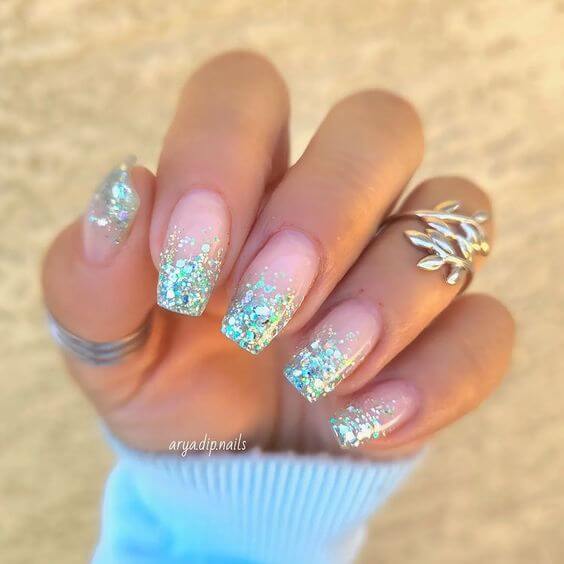 nude with blue glitter summer beach vacation nails