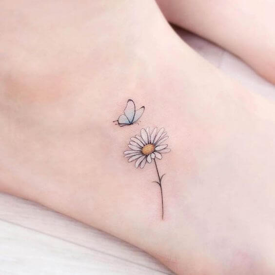cute small butterfly and daisy flower girly foot tattoo design
