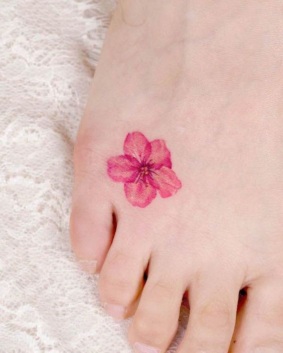 cute cherry blossom girly foot tattoo design