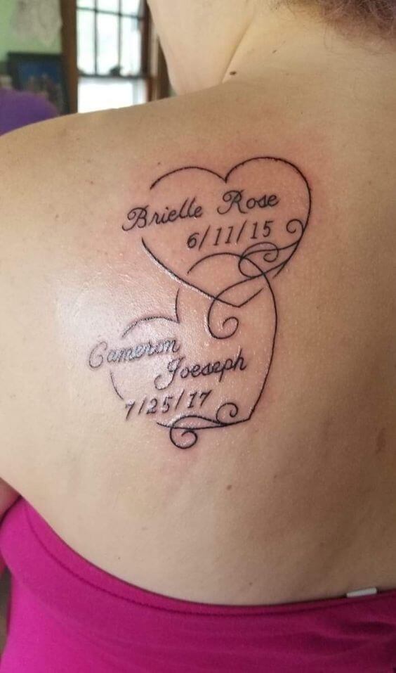 heart design with grandchildren names and date of birth tattoo