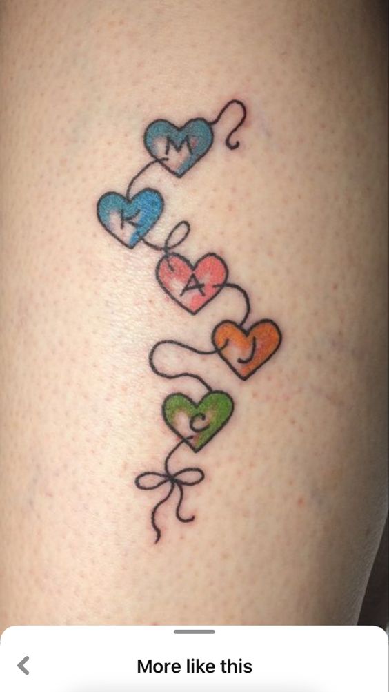 colorful small hearts with grandchildren name initials tattoo designs