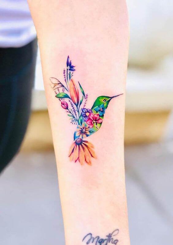 hummingbird forearm tattoo design for women