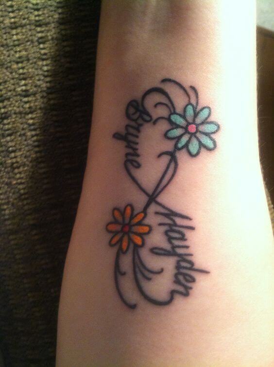flowers and grandchildren names with infinity sign tattoo design