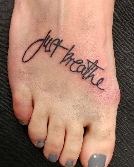 cool script just breathe girly foot tattoo design