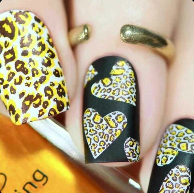 matte cheetah print with heart nail art design idea